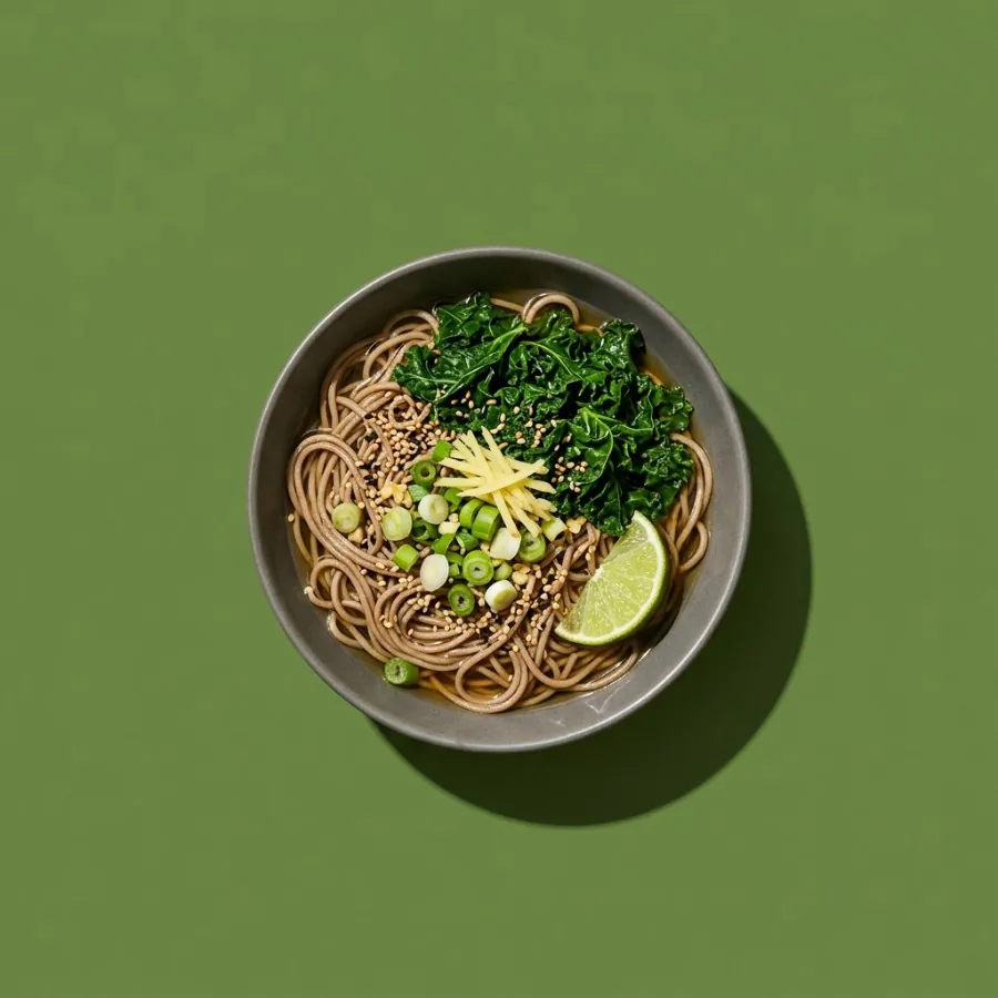 Warm soba with ginger, spring onion and kale